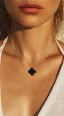 Clover Pendant Gold Dipped Chain Necklace in Black on neutral background