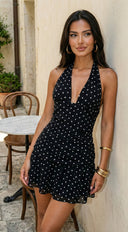 Bellavina Polka Dot Halter Mini Dress in Black back view on model