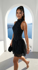 Colette Polka Dot High Neck Mini Dress in Black detail shot of stitching and finish hemline and silhouette d additional angle