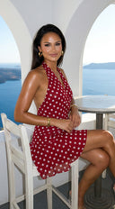 Amour Polka Dot Wrap Mini Dress in Red fabric drape close-up hemline and silhouette detail