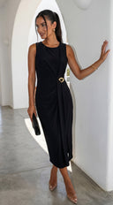 Aureva Pleated Gold Accent Midi Dress in Black stitching and texture close-up hemline and silhouette detail