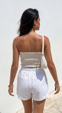 Mara Pintuck Tie Waist Shorts in White full length three-quarter angle