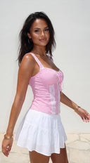 Calypsea Crinkle Gauze Tiered Mini Skort in White hemline and silhouette detail