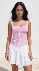 Calypsea Crinkle Gauze Tiered Mini Skort in White close-up of tiered layers
