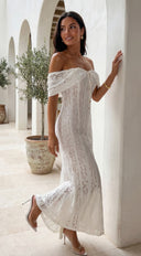 Lunessa Lace Off Shoulder Maxi Dress in Cream White detail shot of lace overlay hemline and silhouette detai additional angle