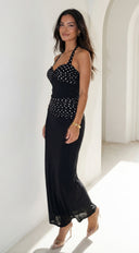 Zelara Polka Dot Twist Halter Maxi Dress in Black detail shot of stitching and finish hemline and silhouette additional angle