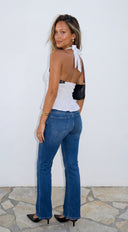 Valette Polka Dot Lace Halter Top in White hemline and silhouette detail