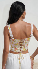Virelia Floral Lace Corset Top in Yellow Multi hemline and silhouette detail