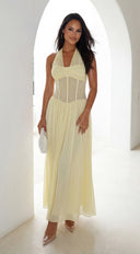 Aurevyn Halter Mesh Maxi Dress in Butter Yellow hemline and silhouette detail