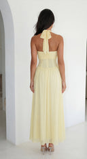 Aurevyn Halter Mesh Maxi Dress in Butter Yellow stitching and texture close-up hemline and silhouette detail