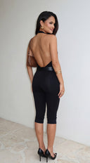 Neraya Scoop Halter Capri Jumpsuit in Black back view on model
