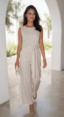 Zaylina Linen Waist Tie Jumpsuit in Natural Beige stitching and texture close-up hemline and silhouette detail