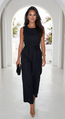 Zaylina Linen Waist Tie Jumpsuit in Black stitching and texture close-up hemline and silhouette detail