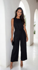 Zaylina Linen Waist Tie Jumpsuit in Black full length front view on model