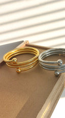 Sia Metal Wrap Flexible Bangle Bracelet - Gold