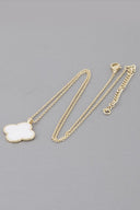 Clover Pendant Gold Dipped Chain Necklace flat lay product shot additional angle