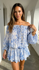 Bahama Floral Off Shoulder Ruffle Mini Dress in Blue stitching and texture close-up hemline and silhouette det texture detail