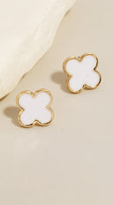 Gold Dipped Clover Stud Earrings in White on neutral background