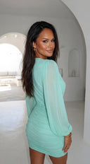 Deniz Surplice Mini Dress in Mint Green close-up of fabric and construction