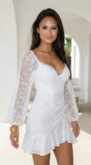 Nerano Lace Ruffle Asymmetric Mini Dress in White stitching and texture close-up hemline and silhouette detail