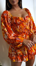 Mel Orange Multi Color Floral Print Romper styled outfit flat lay