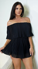 Jazmin Off Shoulder Pleated Romper in Black side profile view on model