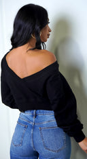 Kali Off Shoulder Sweater in Black side profile view on model