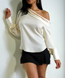 Taylor One Shoulder Satin Top in Cream close-up of satin fabric