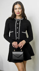 Amara Set in Black stitching and texture close-up hemline and silhouette detail