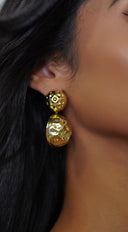 Glimmering Layered Hammered Round Earrings in Gold styled on model