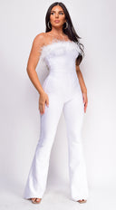 Xoey Feather Detail Bandage Jumpsuit in White close-up of bandage fabric