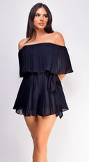 Jazmin Off Shoulder Pleated Romper in Black hemline and silhouette detail