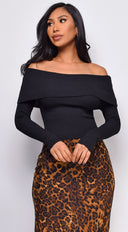 Agata Off Shoulder Sweater Top in Black close-up of off-shoulder neckline