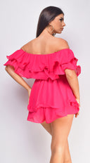 Karli Off Shoulder Ruffled Romper in Pink hemline and silhouette detail