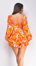Mel Orange Multi Color Floral Print Romper close-up of neckline and shoulder detail