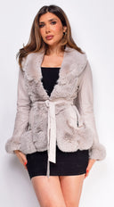 Ekaterina Cream Beige PU Leather Belted Coat side profile view on model