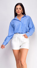Manda Pleated Shorts in White full length front view on model