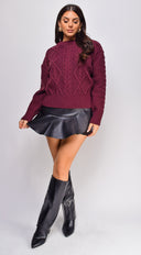 Giselle Ruffle Flare Faux Leather Mini Skort in Black close-up of faux leather finish