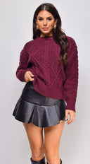 Giselle Ruffle Flare Faux Leather Mini Skort in Black back view on model