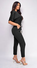 Lia Black V Neck Jumpsuit side profile view on model