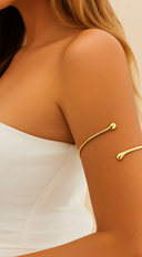 Simplicity Arm Cuff bracelet in Gold on neutral background