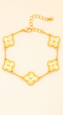 Gia Textured Clover Bracelet in Gold on neutral background