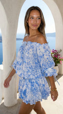 Bahama Floral Off Shoulder Ruffle Mini Dress in Blue fabric drape close-up hemline and silhouette detail