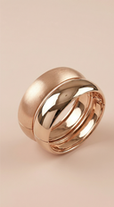 Two Metal Bangle Bracelet Set in Gold on neutral background