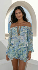 Cyrene Floral Off-Shoulder Mini Dress in Shoulder Mini Dress - Floral Green stitching and texture close-up hemline and