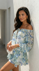 Cyrene Floral Off-Shoulder Mini Dress in Shoulder Mini Dress - Floral Green back view on model