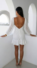 Nerano Lace Ruffle Asymmetric Mini Dress in White full length three-quarter angle