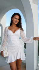 Nerano Lace Ruffle Asymmetric Mini Dress in White fabric drape close-up hemline and silhouette detail