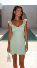 Mintéa Ruffle Trim Mini Dress in Green back view on model