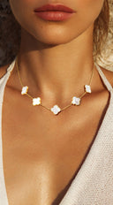 Eternal Gold Dipped Clover Necklace in White on neutral background